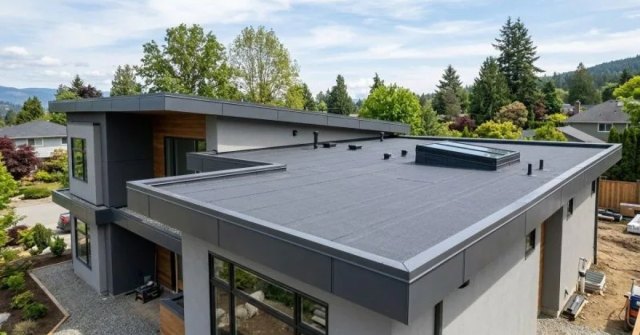 Flat roof surface with visible drainage and seam details