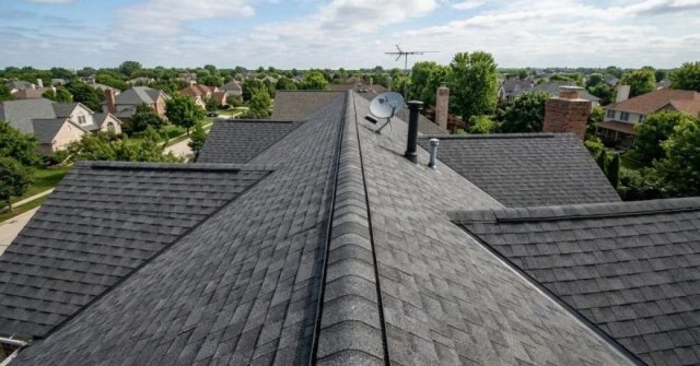 Homeowner documenting a roof concern for inspection