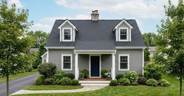 Homeowner documenting damaged roof shingles for an estimate
