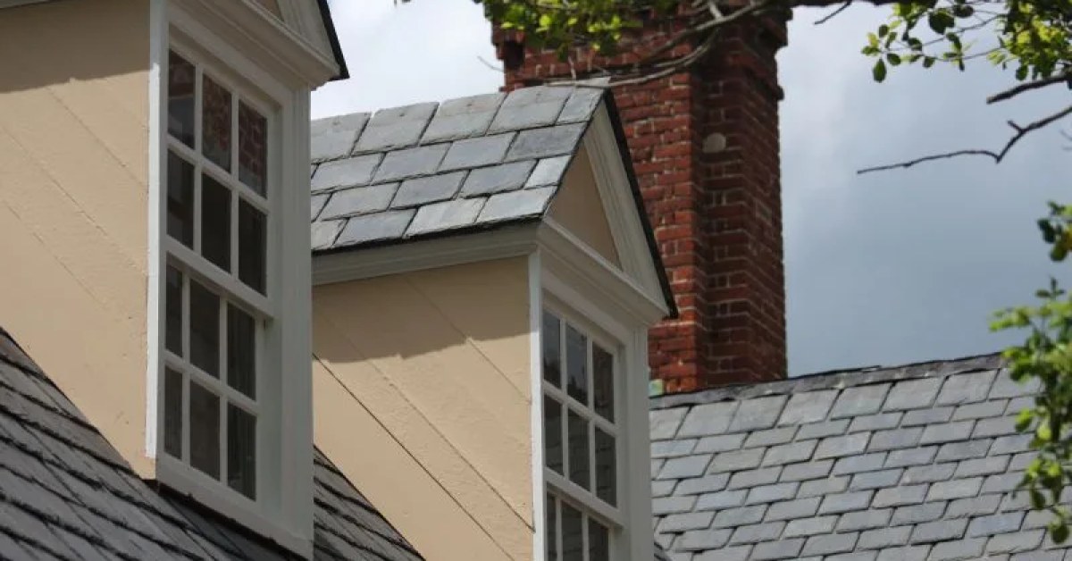 Slate roof with damaged slates identified for repair